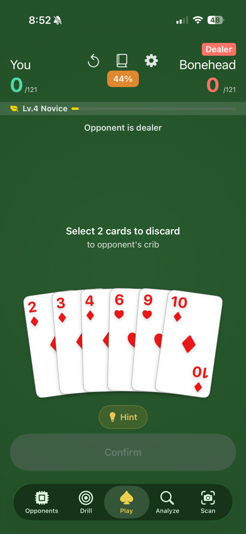 A game of cribbage in progress, prompting the player to select two cards to discard